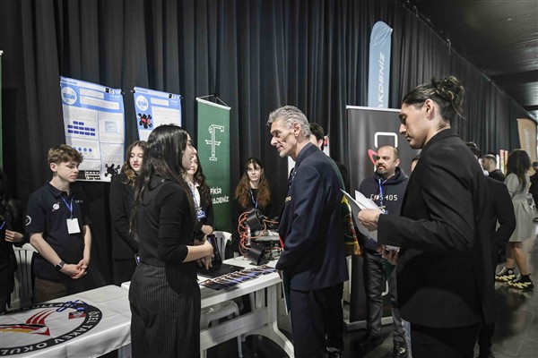 Jury members evaluating an exhibition project